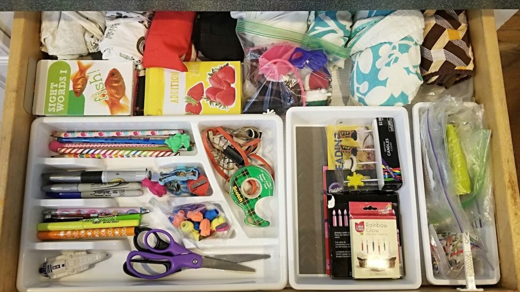 Organized junk drawer with fast and cheap solutions from the Dollar Tree