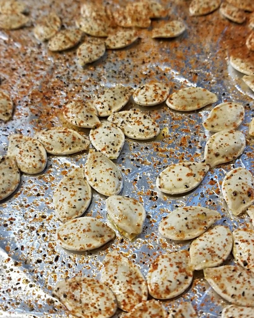 Closeup of seasoned pumpkin seeds for flavored pumpkin seed recipe