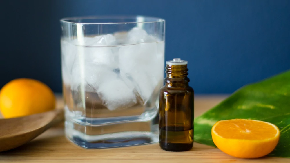 How to use essential oils for detoxification such as drinking therapeutic grade oil in a glass of water 