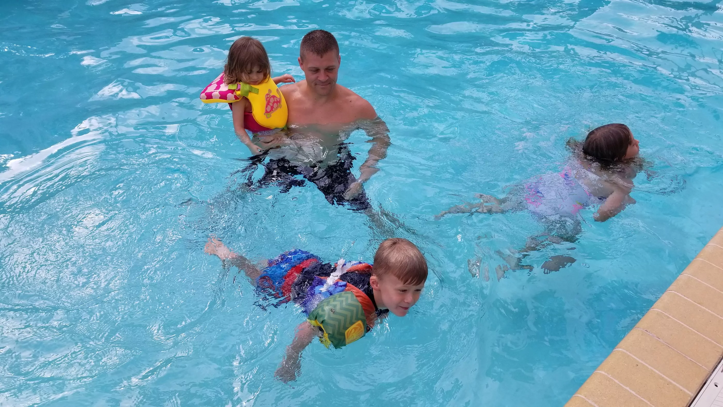 fun in the hotel pool for vacation activities for kids