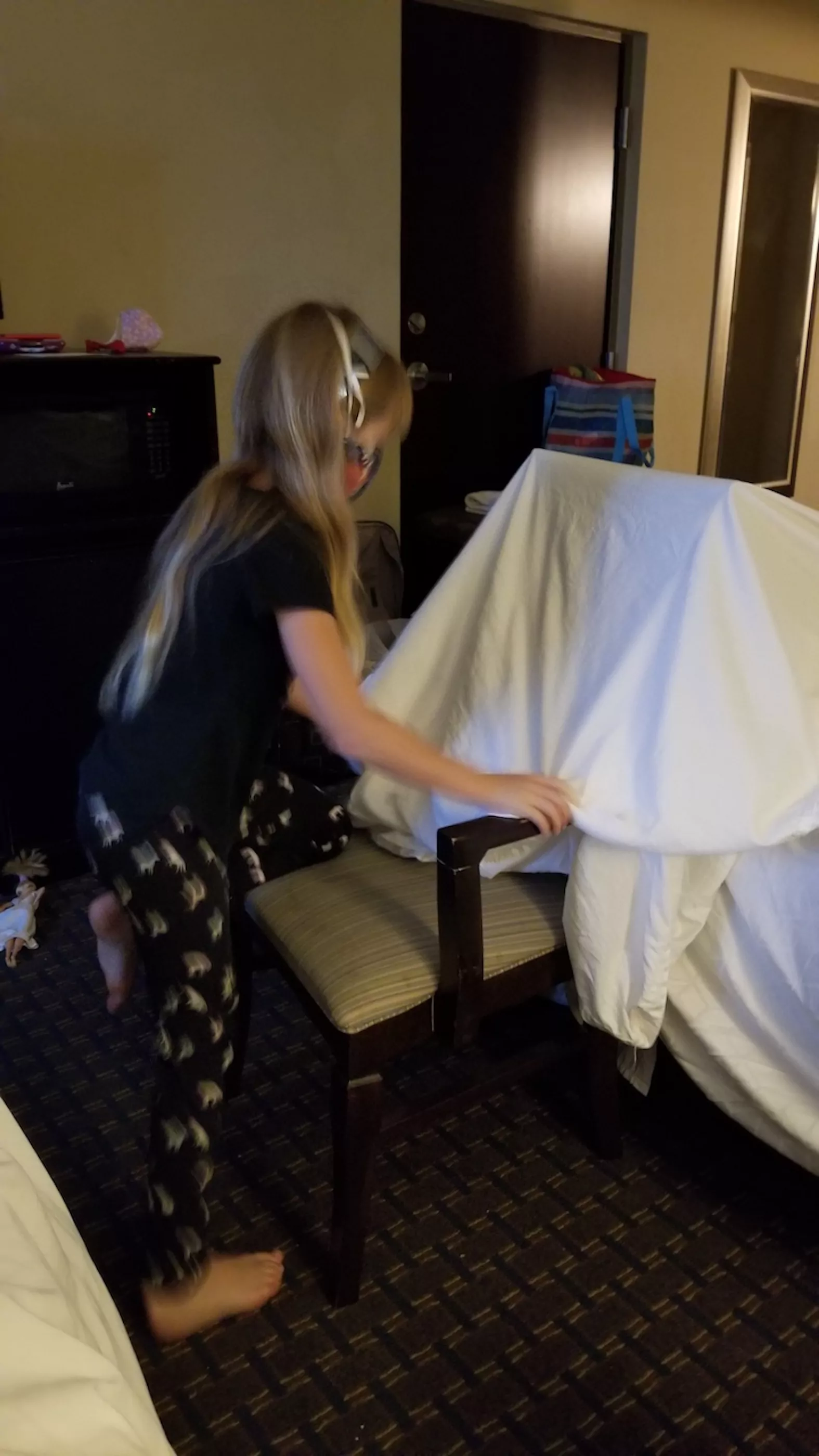make a fort from blankets and chairs for a fun thing to do in a hotel on vacation