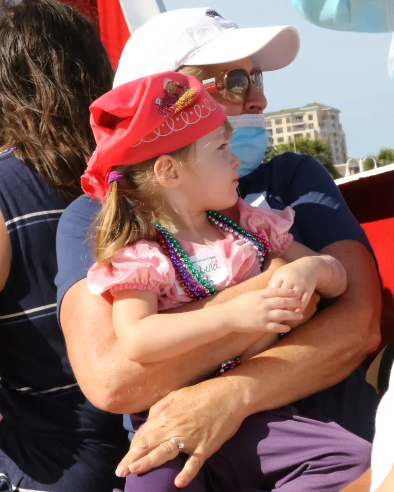 Baby girl dressed as pirate enjoying a Florida dolphin cruise Clearwater Beach