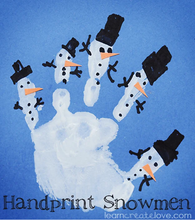 Toddler handprint snowman art on www.artsyfartzy.com