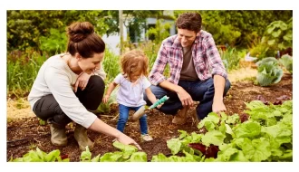 Living green eco-friendly family in outdoor garden